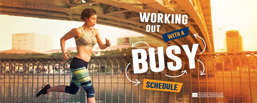 woman running under a bridge with text that reads " Working Out with a Busy Schedule"