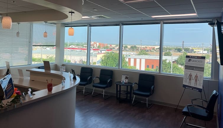 The waiting room and lobby at Airrosti Kyle inside Hays Surgery Center