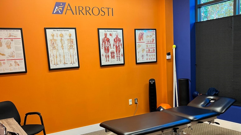 The treatment room inside Airrosti Charlottesville, where patients will work with an Airrosti Certified Provider to identify and treat the sources of their pain.