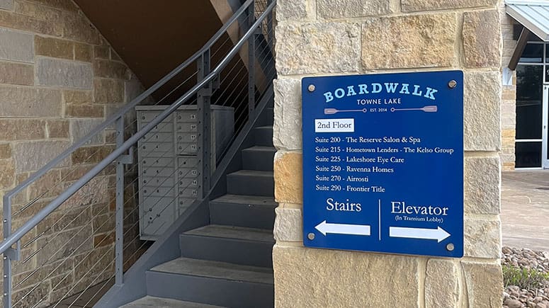 photo of the exterior stairs leading up to the front entrance of Airrosti Towne Lake