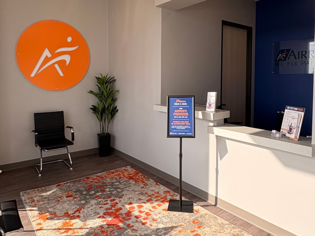 Front desk in the lobby at Airrosti China Grove