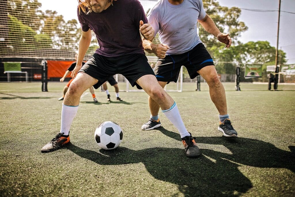 Group of People Playing Soccer