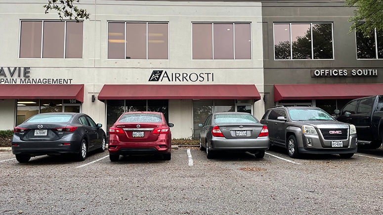 The exterior of the building at Airrosti Alavie Interventional Pain Management.