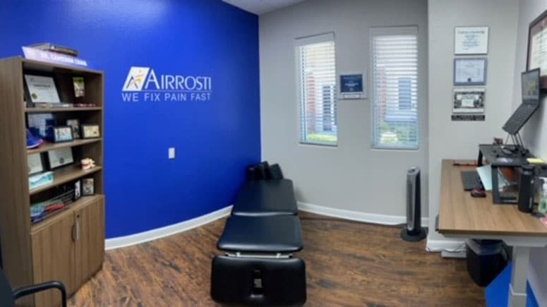 The primary exam room at Airrosti Colleyville