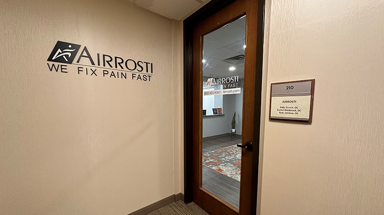 The suite entrance to Airrosti Red River in Austin, TX.