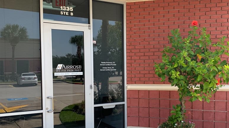 A view of the front entrance into Airrosti Space Center