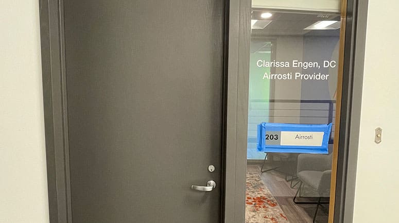 The entrance to suite 203 for Airrosti Kirkland