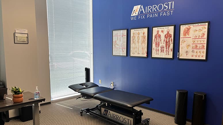 The treatment room at Airrosti Willowbrook where patients will have a physical assessment to identify and treat their pain