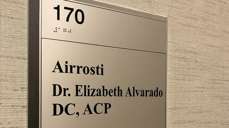 The suite 170 entrance sign to Airrosti Willowbrook where Airrosti Certified Provider Dr. Elizabeth Alvarado practices