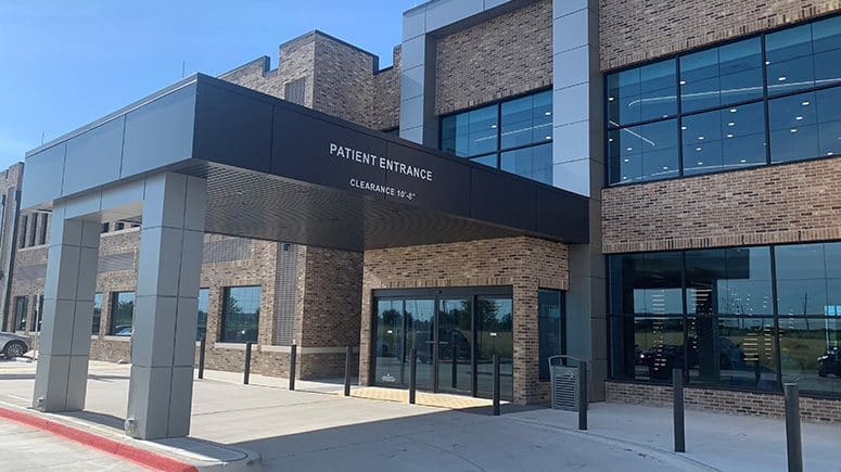 The entrance to the building at Airrosti Village Health Partners Frisco