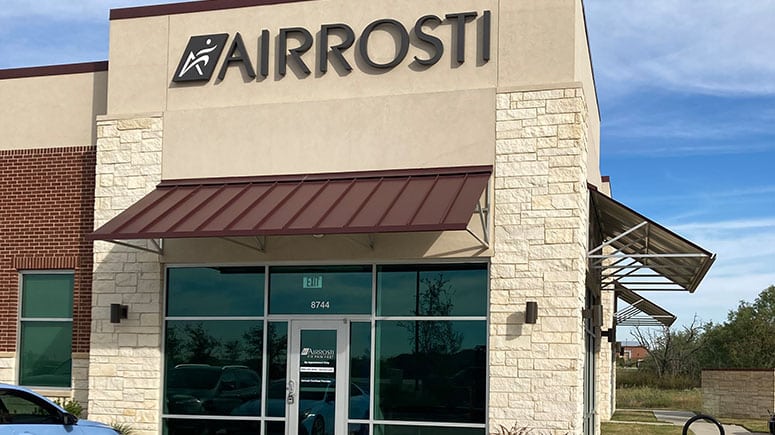 The exterior of the building that Airrosti Alliance is located in.