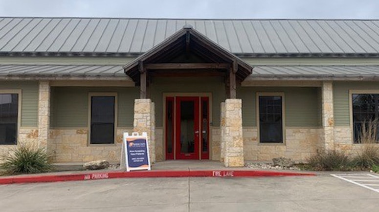 The front entrance to the building of Airrosti San Marcos in San Marcos, Texas.