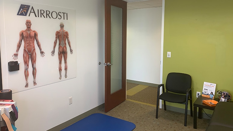 Inside the treatment room at Airrosti Tyson, patients will work with their Airrosti Certified Recovery Specialist to learn their at-home physical care routine to promote and maintain long-term MSK health.