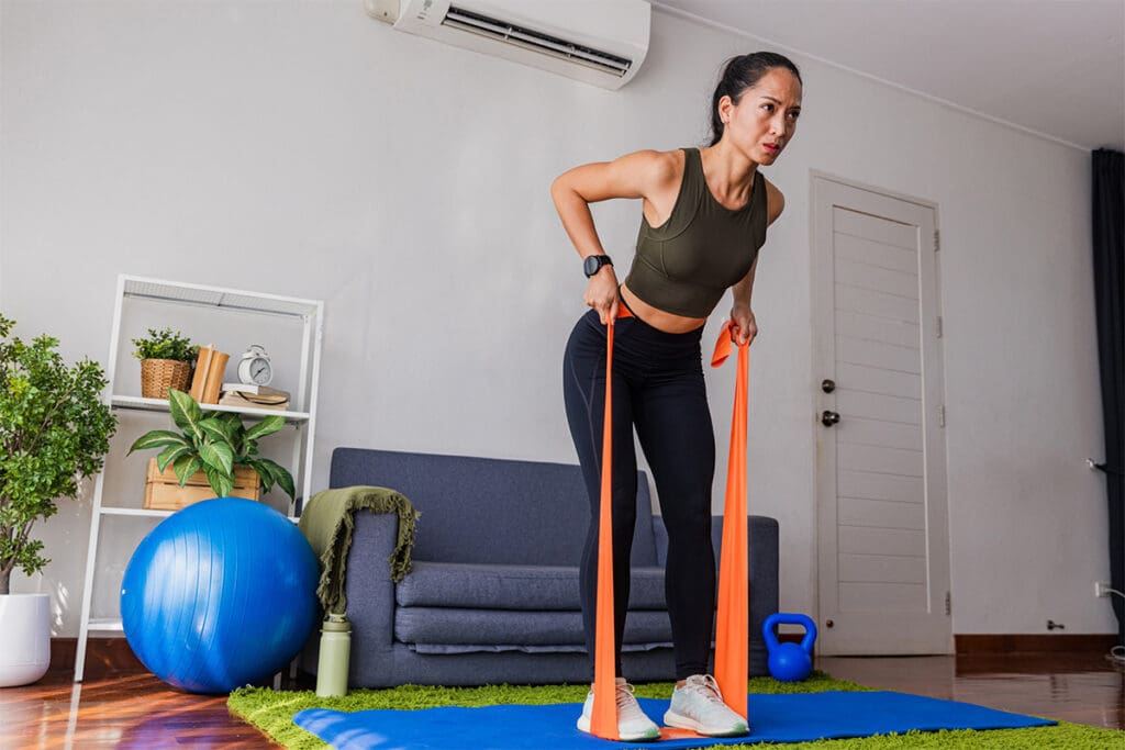 Flex Member doing exercises at home