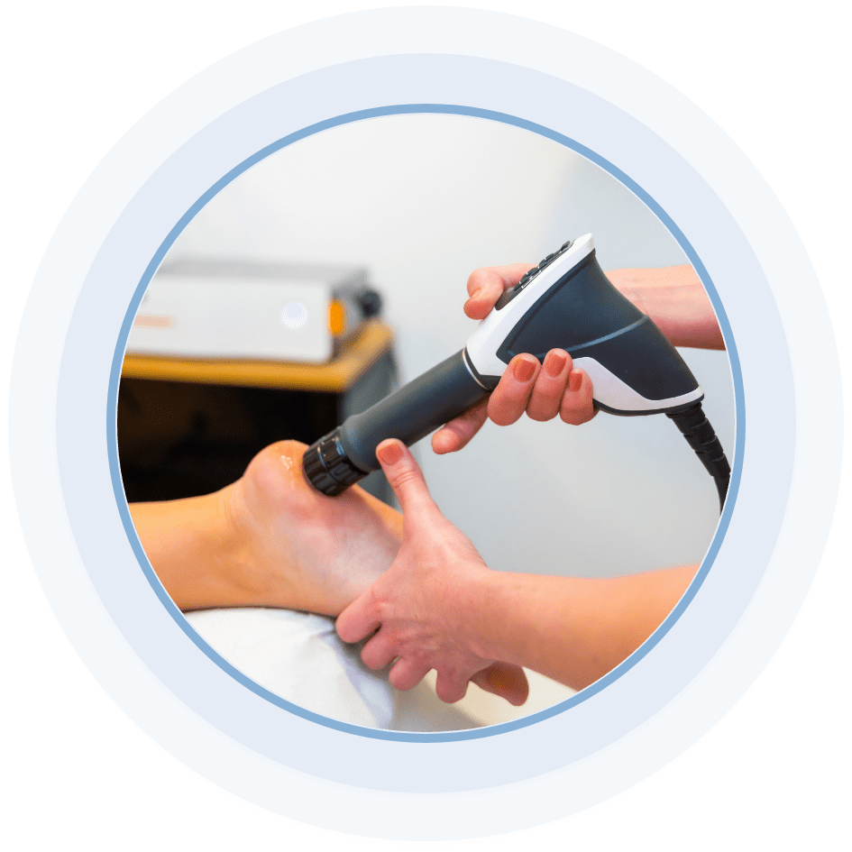 Shockwave treatment being performed on a patients foot