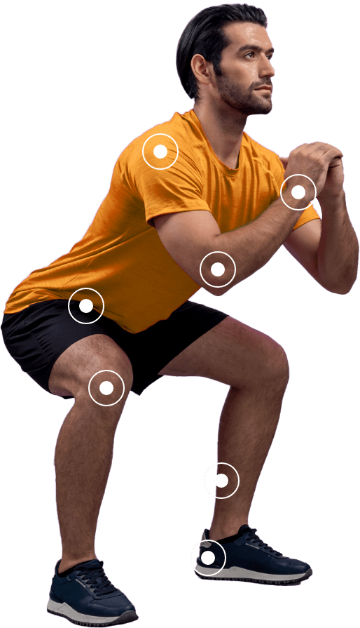 Man in squatting position with markers showing all of the areas Airrosti can treat using shockwave therapy