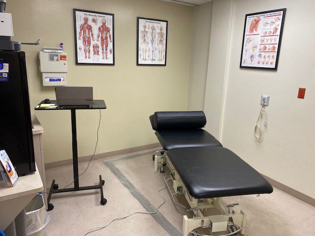 Treatment room at Airrosti Gonzales