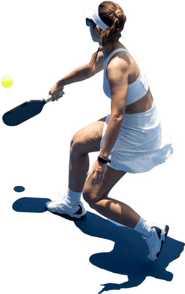 Woman playing pickelball