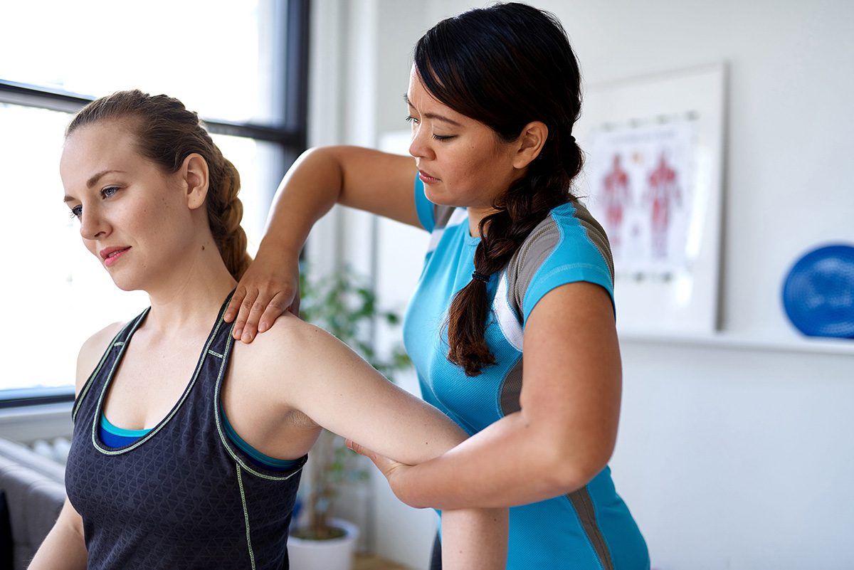 provider performing manual therapy on a patient