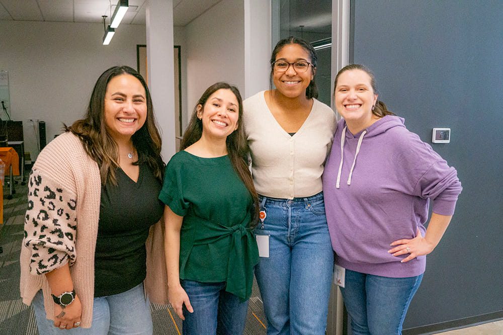 Airrosti employees celebrating Thanksgiving at the annual potluck