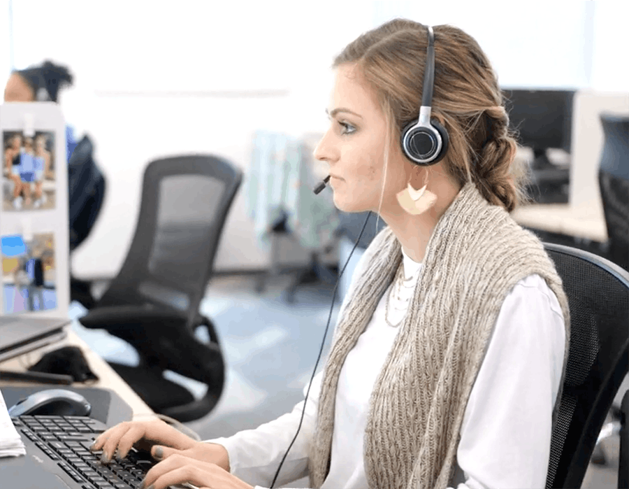 PAT team member taking a patient call at Airrosti